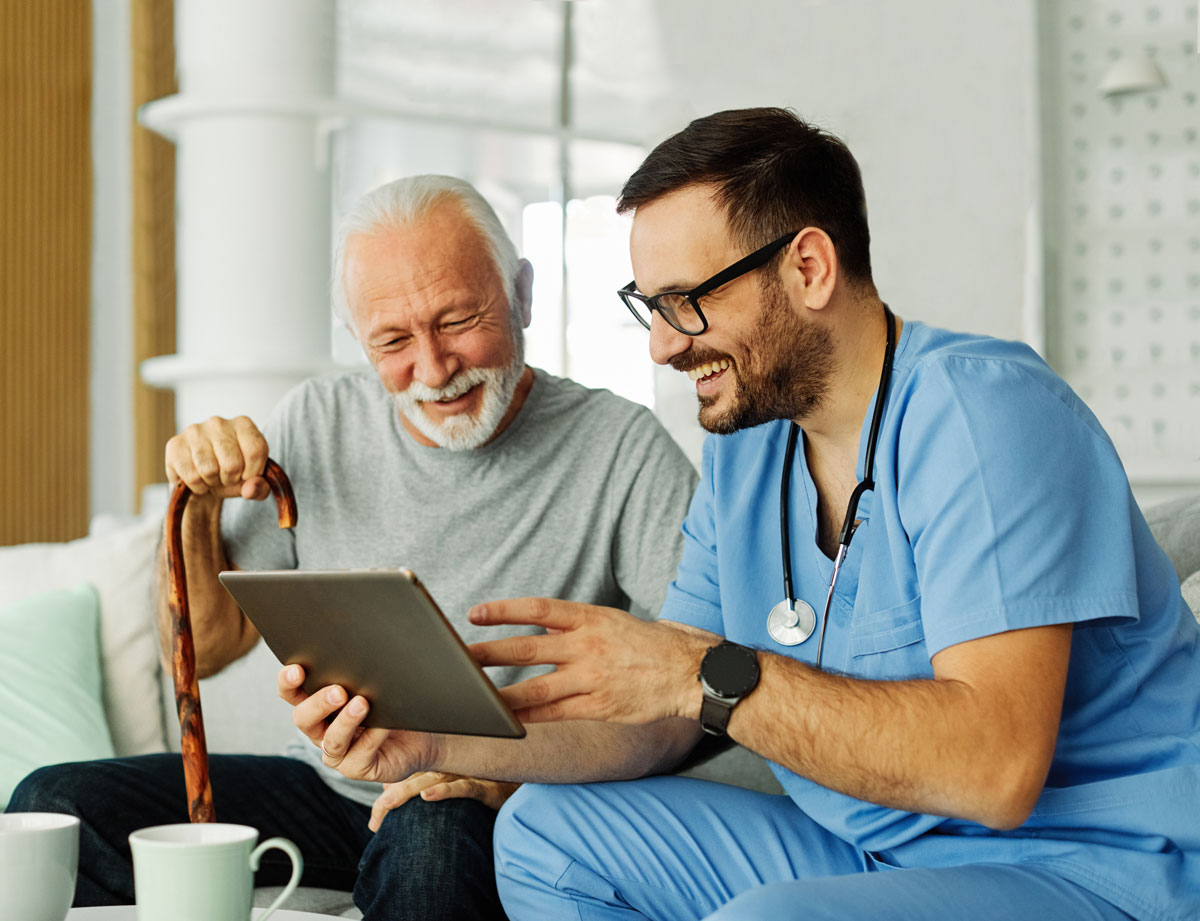 nurse showing patient ipad