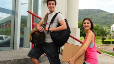 students moving into college dorm