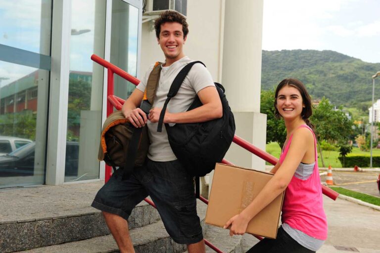 students moving into college dorm