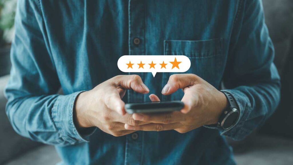 user on phone adding online 5 star review