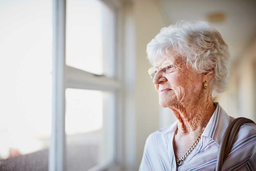 Woman with Alzheimers looking out the window