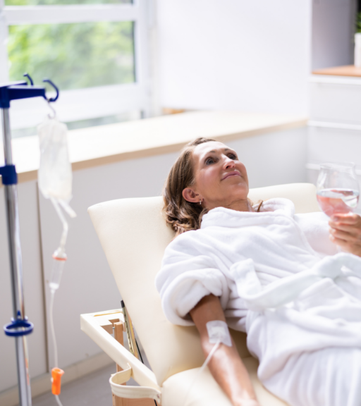 Middle-aged woman receiving infusion therapy for amyloidosis