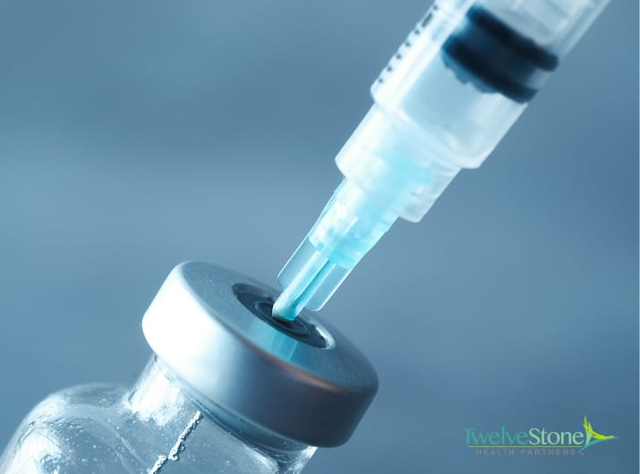 Medication vial with syringe used for infusion treatment