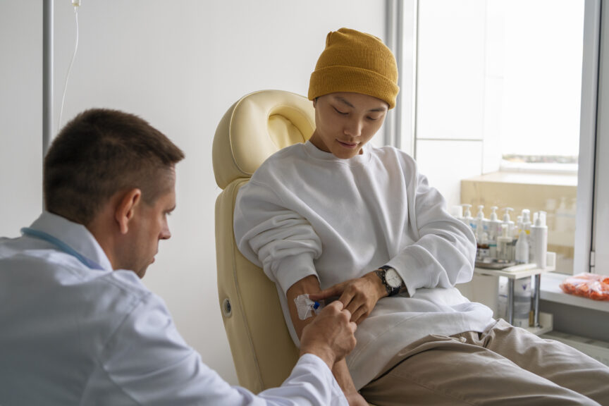 Patient receiving IVIG therapy in a clinical setting as part of treatment for myasthenia gravis.