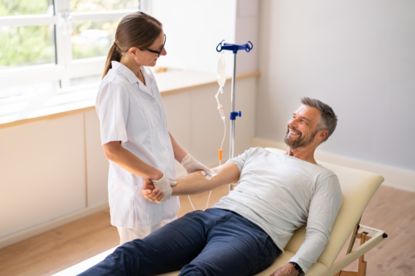 Patient receiving infusion therapy to help manage multiple chronic conditions.